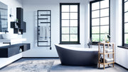 ICO Vasto electric towel warmer in a styled bathroom setting