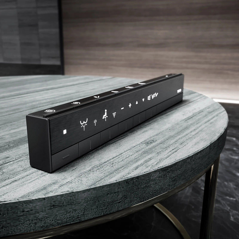 TOTO Neorest LS Black remote control on a table